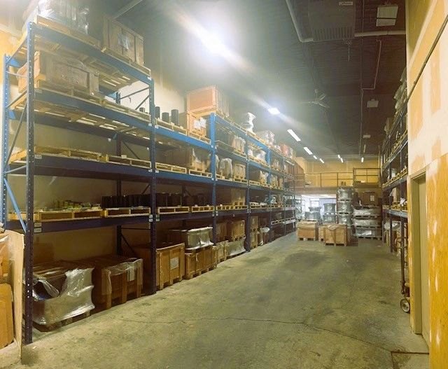 Warehouse racking stocked with piping products